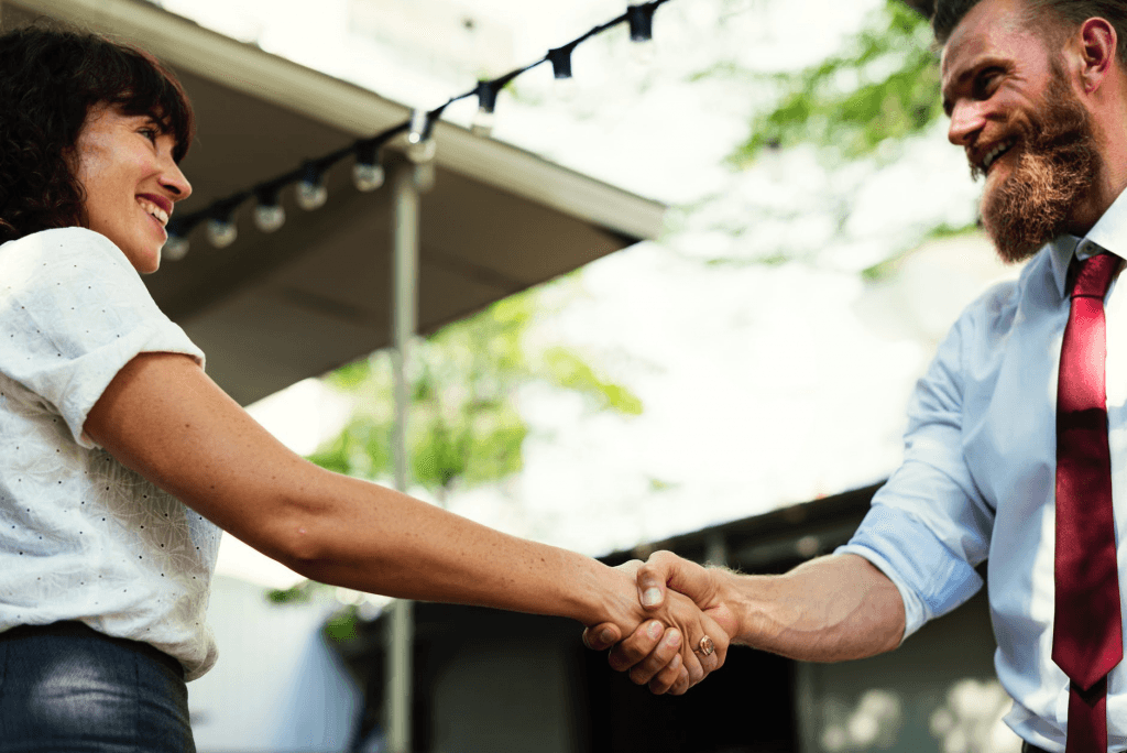 Hand-shaking pople Man and woman shaking hands