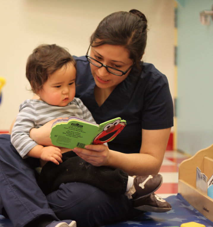 An image of a teacher with a student