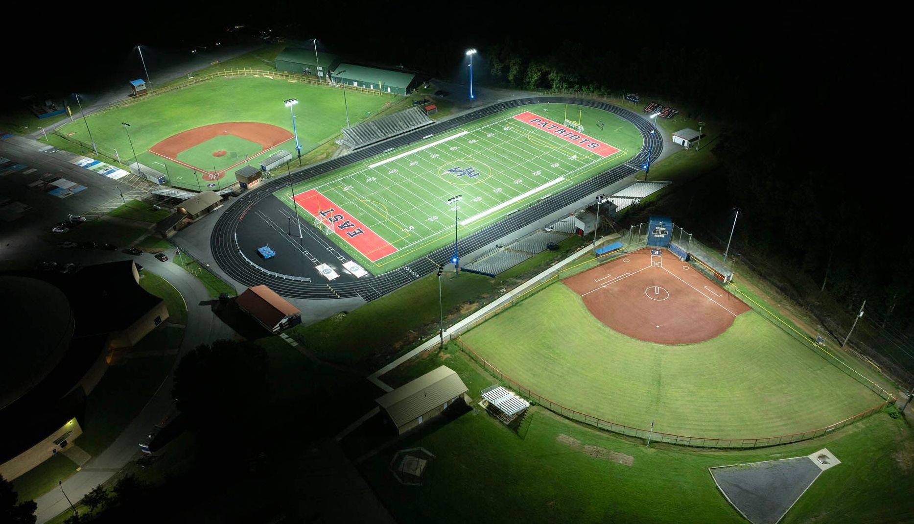 Softball field at Glen Ellyn's Ackerman Park lit at night with Musco LED fixtures