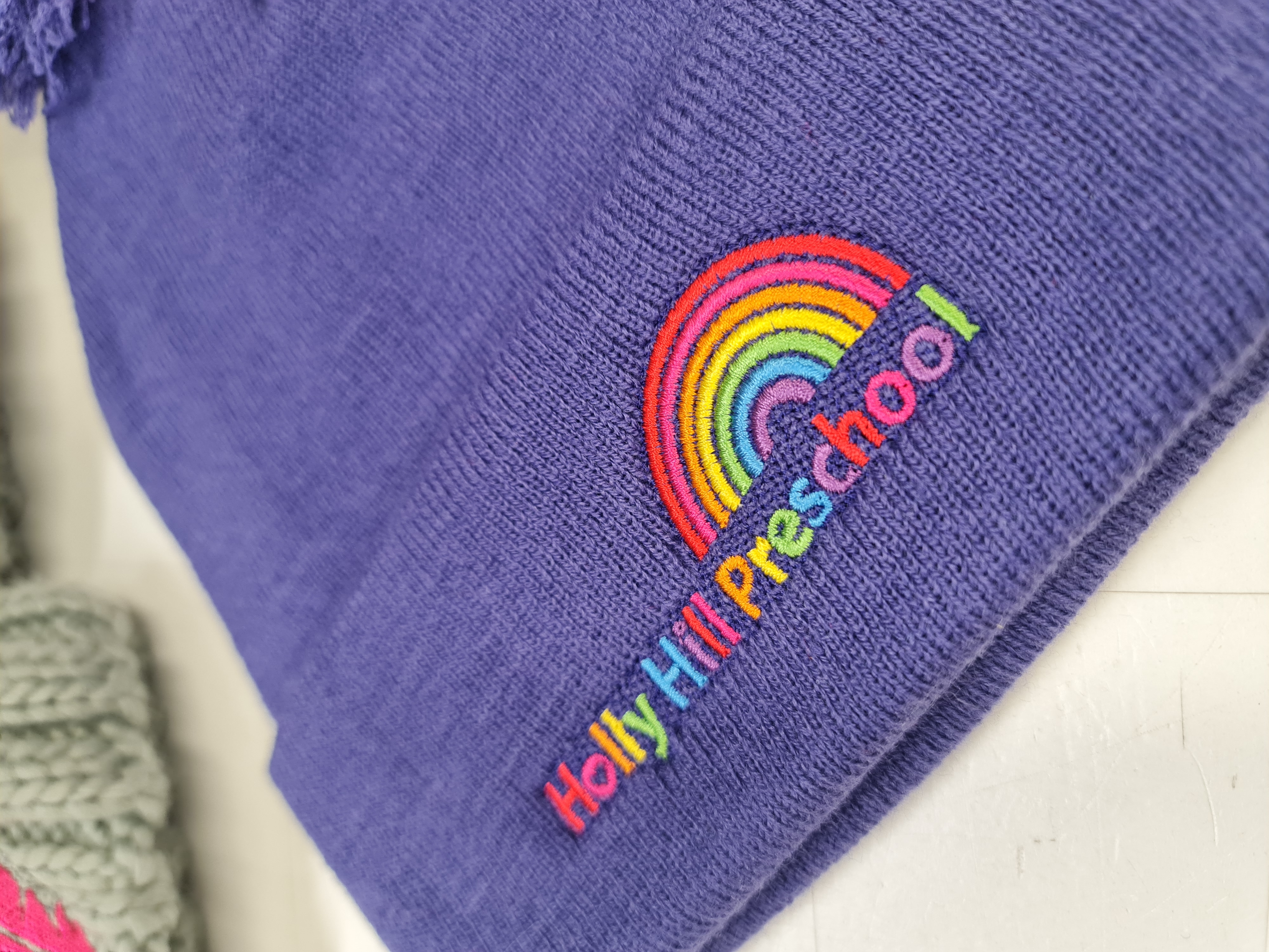 embroidered purple beanie for pre school rainbow multi coloured Image