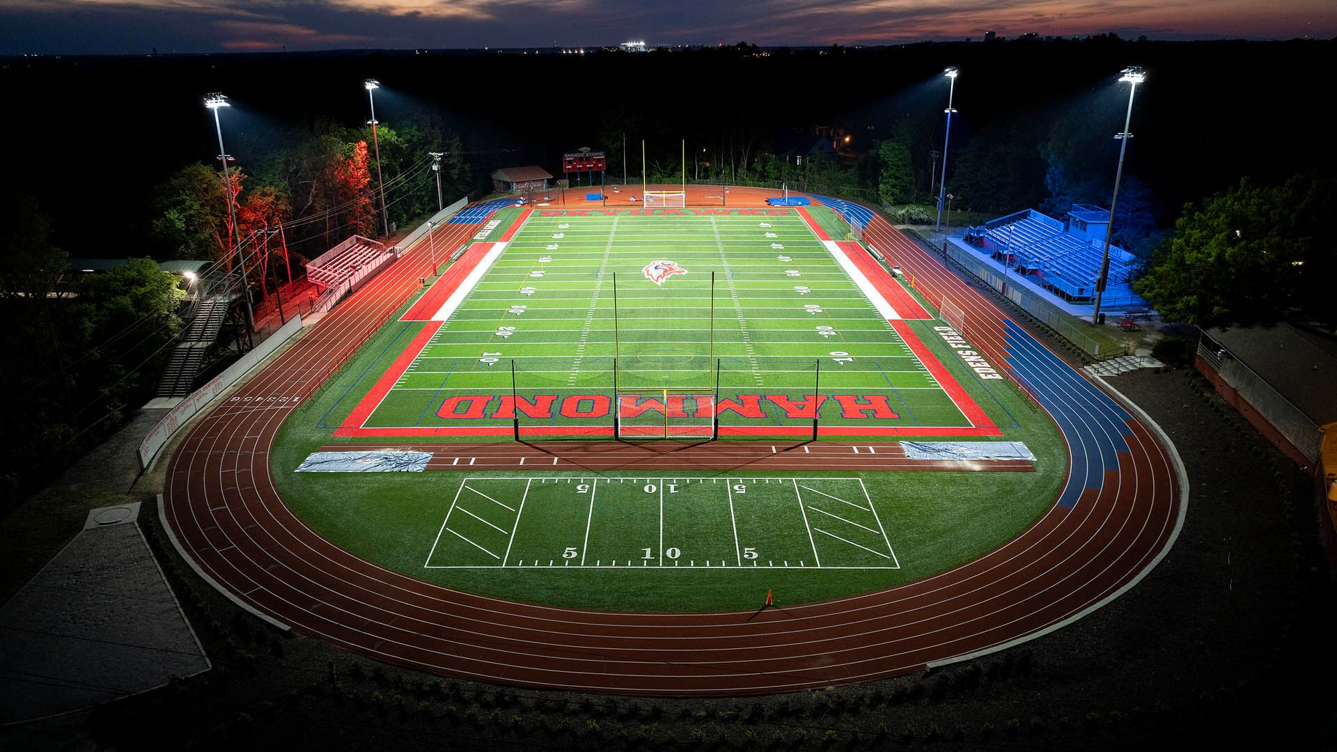 Softball field at Glen Ellyn's Ackerman Park lit at night with Musco LED fixtures
