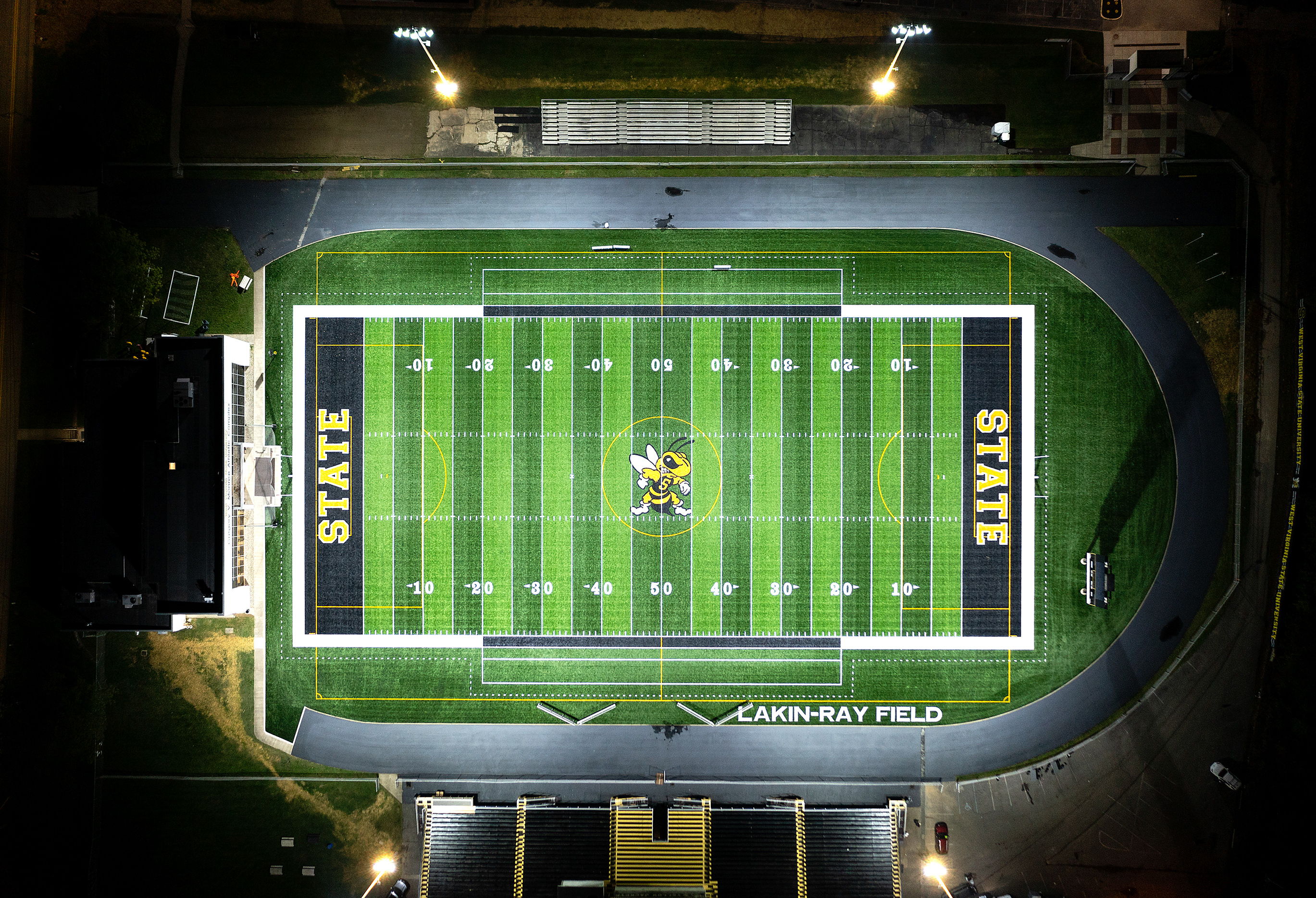 Softball field at Glen Ellyn's Ackerman Park lit at night with Musco LED fixtures