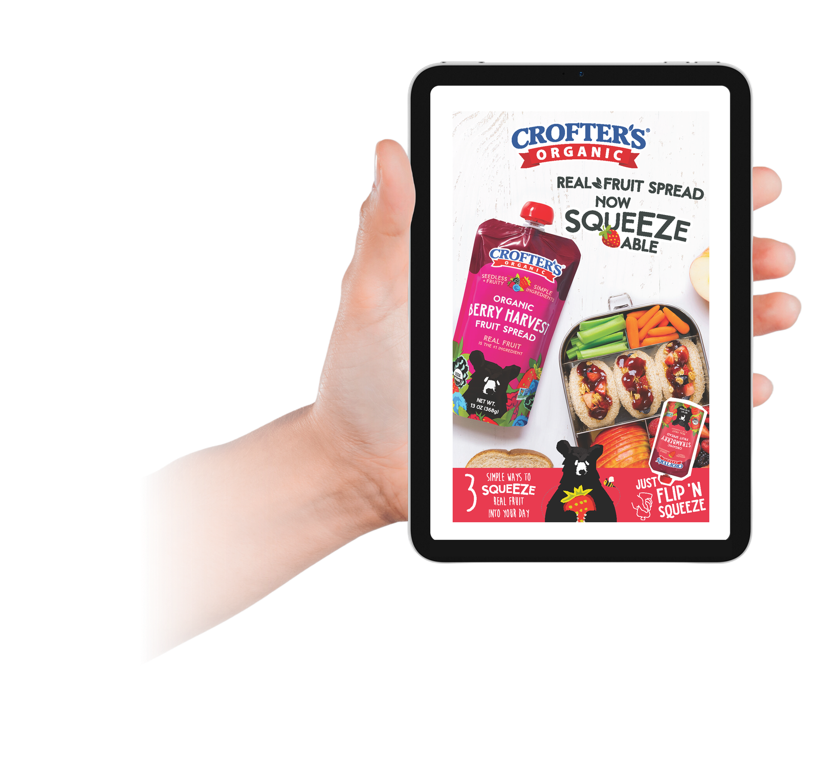 An image of a hand holding a mockup of the recipe book