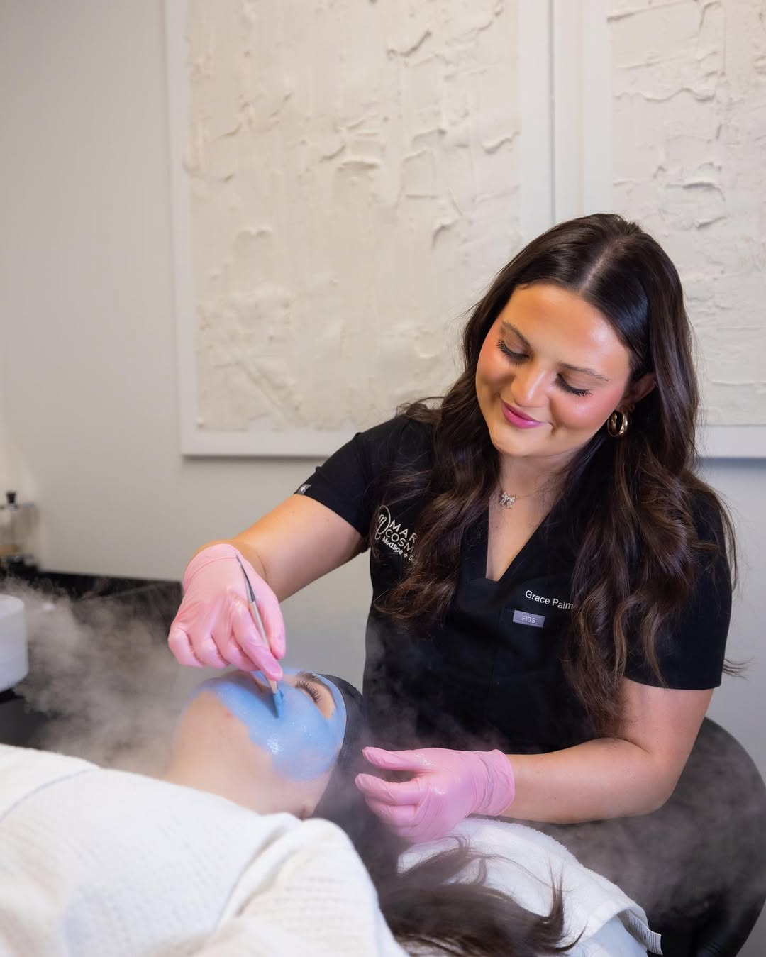 Marvel Cosmetic MedSpa Client receiving a facial