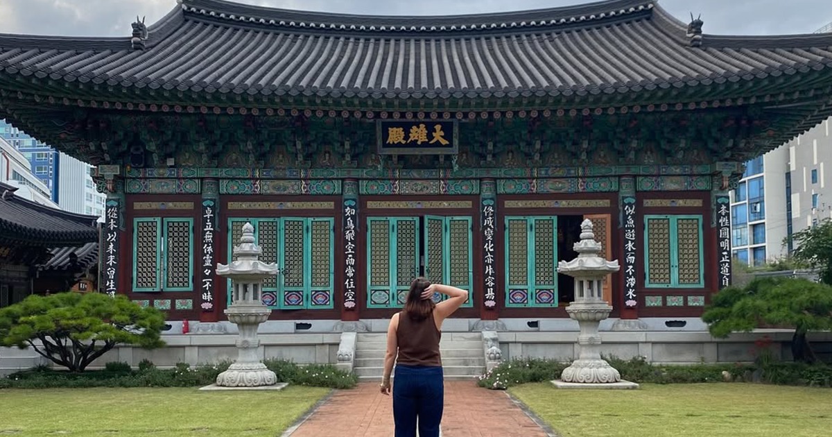 Costs can be confusing A woman looking at a temple