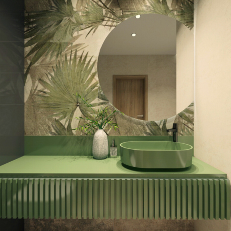 Detal blatu i umywalki w stylu jungle Zbliżenie na blat z zieloną umywalką i dekoracyjną ścianą z liści – łazienka w stylu naturalnym