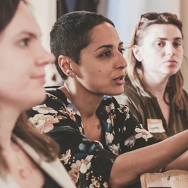 Women discussing during a panel