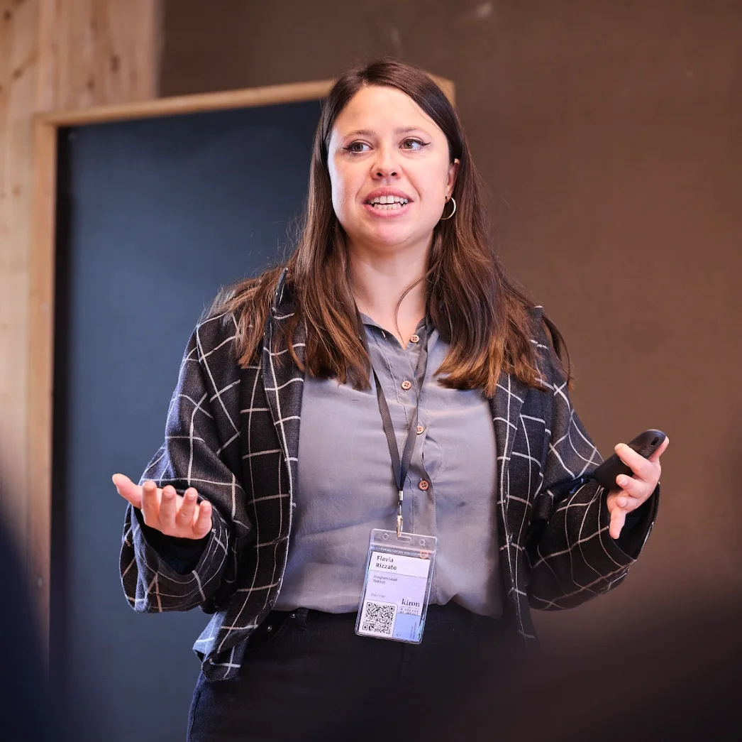 Thrive student holding up a sign saying "I code my future with THRIVE"