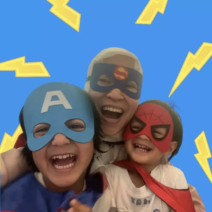 Kids in superhero costumes