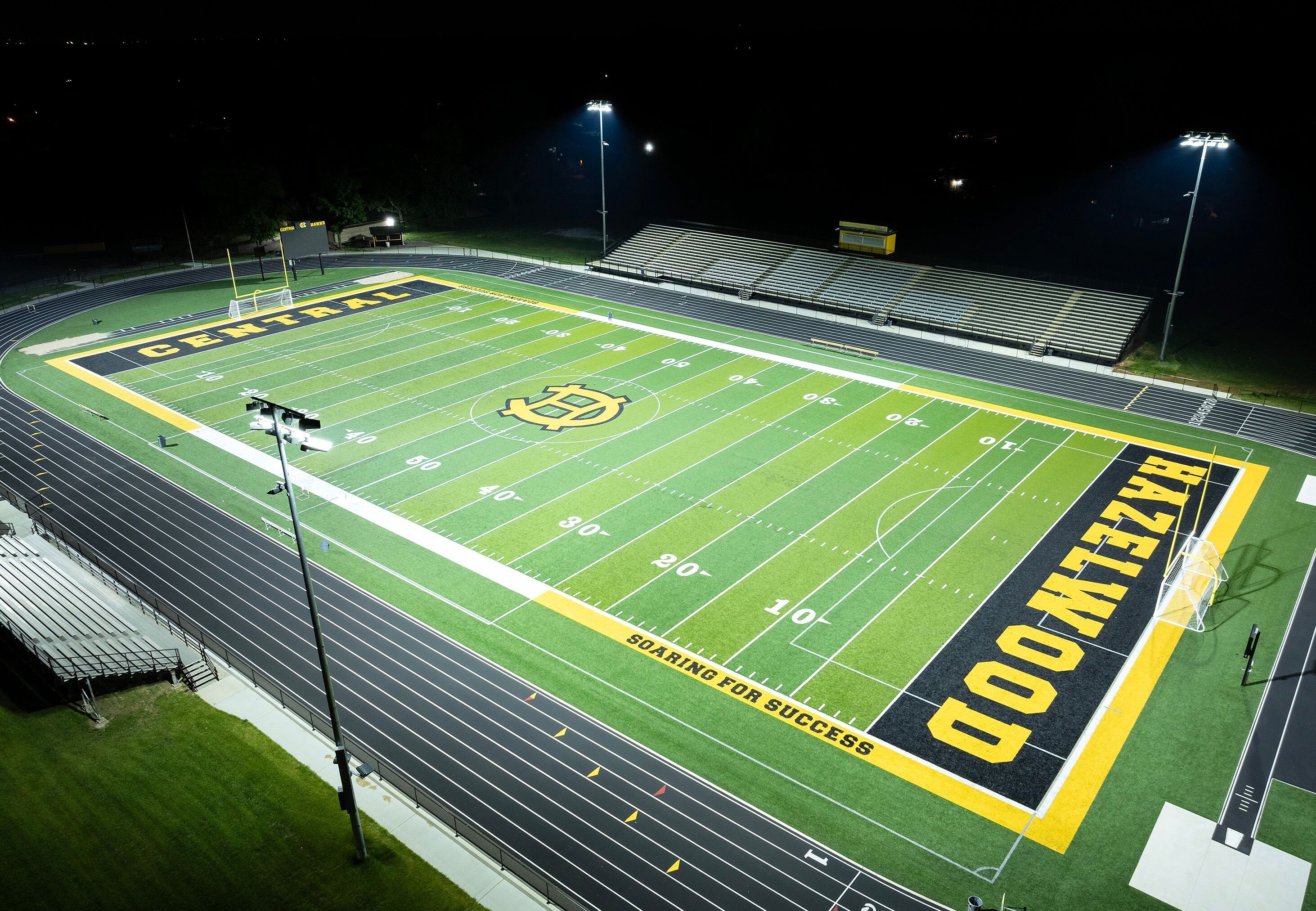 Softball field at Glen Ellyn's Ackerman Park lit at night with Musco LED fixtures