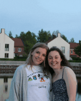 3 slide gif video highlighting Sweden, including an areal view of a pristine lake and trees, two friends posing together, and a historic building.