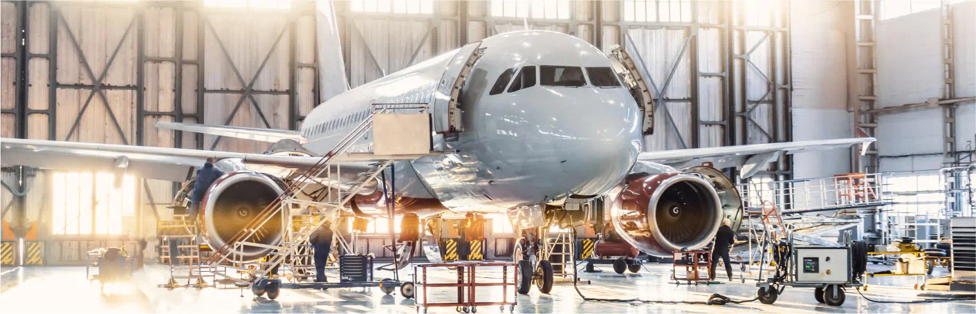 Commercial plane in hangar