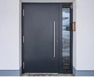 Drzwi aluminiowe zewnętrzne – nowoczesne i trwałe rozwiązanie | Salony Fachowiec Nowoczesne drzwi aluminiowe zewnętrzne w szarym kolorze – trwałe i odporne na warunki atmosferyczne