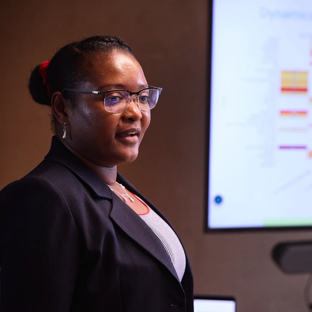 Two women working on a laptop